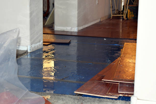 Professional Water Damage Restoration technician working in Chouteau, OK
